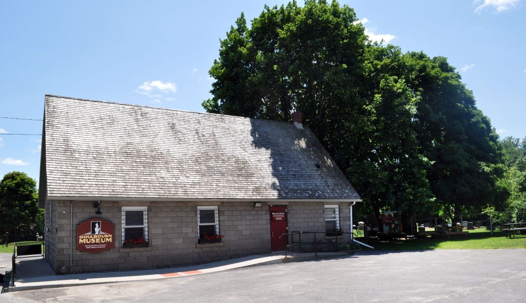 Exterior view of a stone, one-storey building built in 1872.